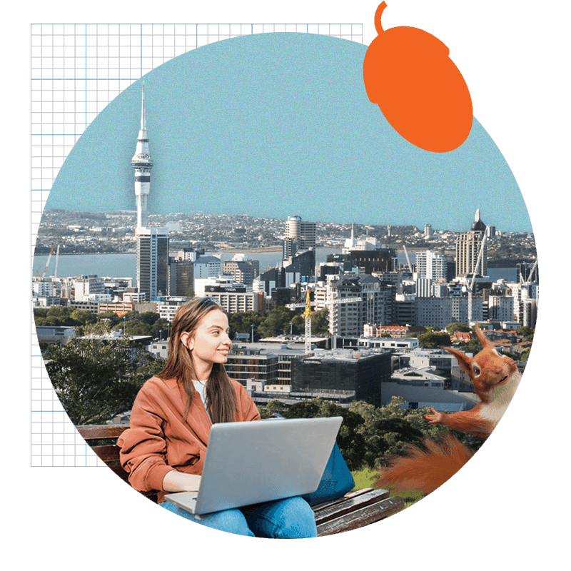 Women sitting on park bench with laptop looking over at Squirrel. Auckland skyline in background.