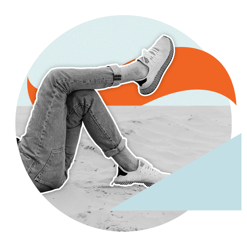 Person lying on back on sandy beach thinking about interest rates