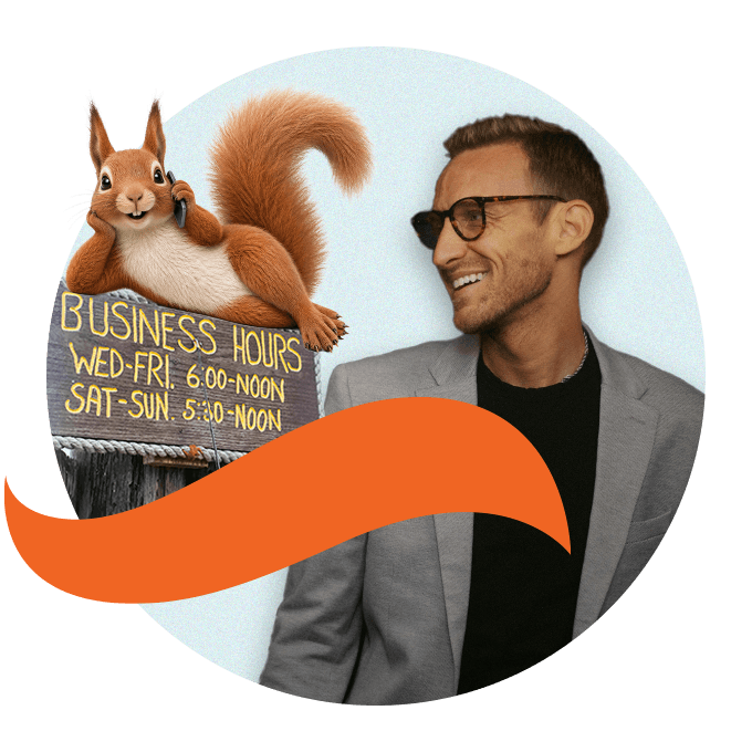 Bernie the Squirrel on the phone relaxing on a 'business hours' sign with man wearing a business suit looking over at him smiling