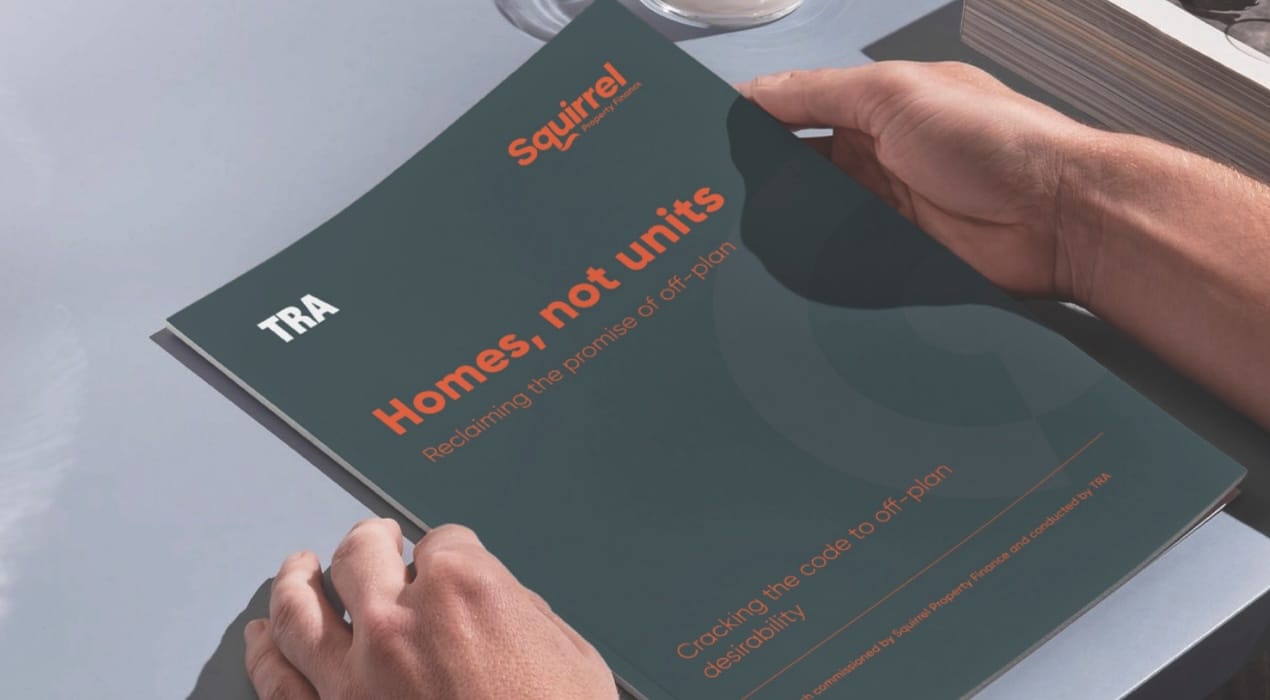 Close up shot of someone reading the Squirrel 'Better Builds for Buyers: Homes, not units' research study