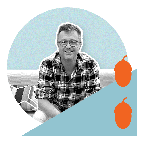 John Bolton sitting on couch talking about regular interest rates