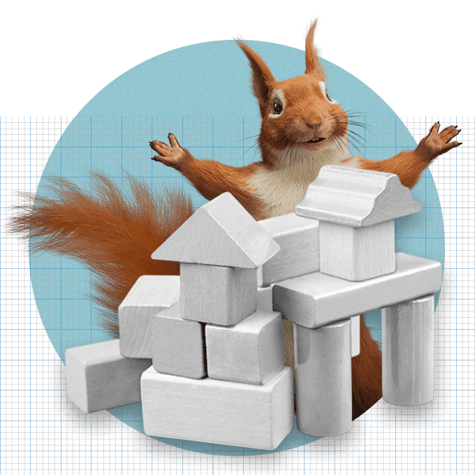 Squirrel standing with paws out, standing behind a wooden blocks